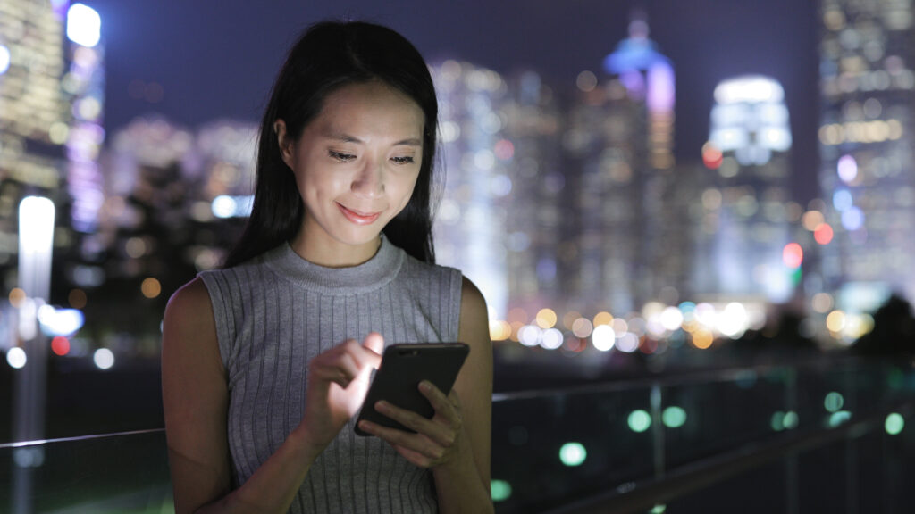 Woman,Use,Of,Cellphone,In,Park